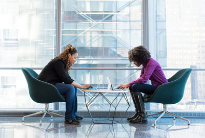 Ladies working in a lounge