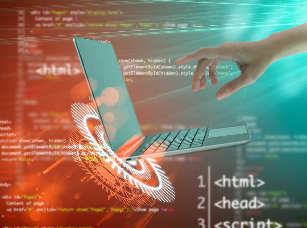 A hand touching a laptop